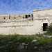 Un varco sormontato da un timpano ci porta in quella che un tempo era la cappella della masseria